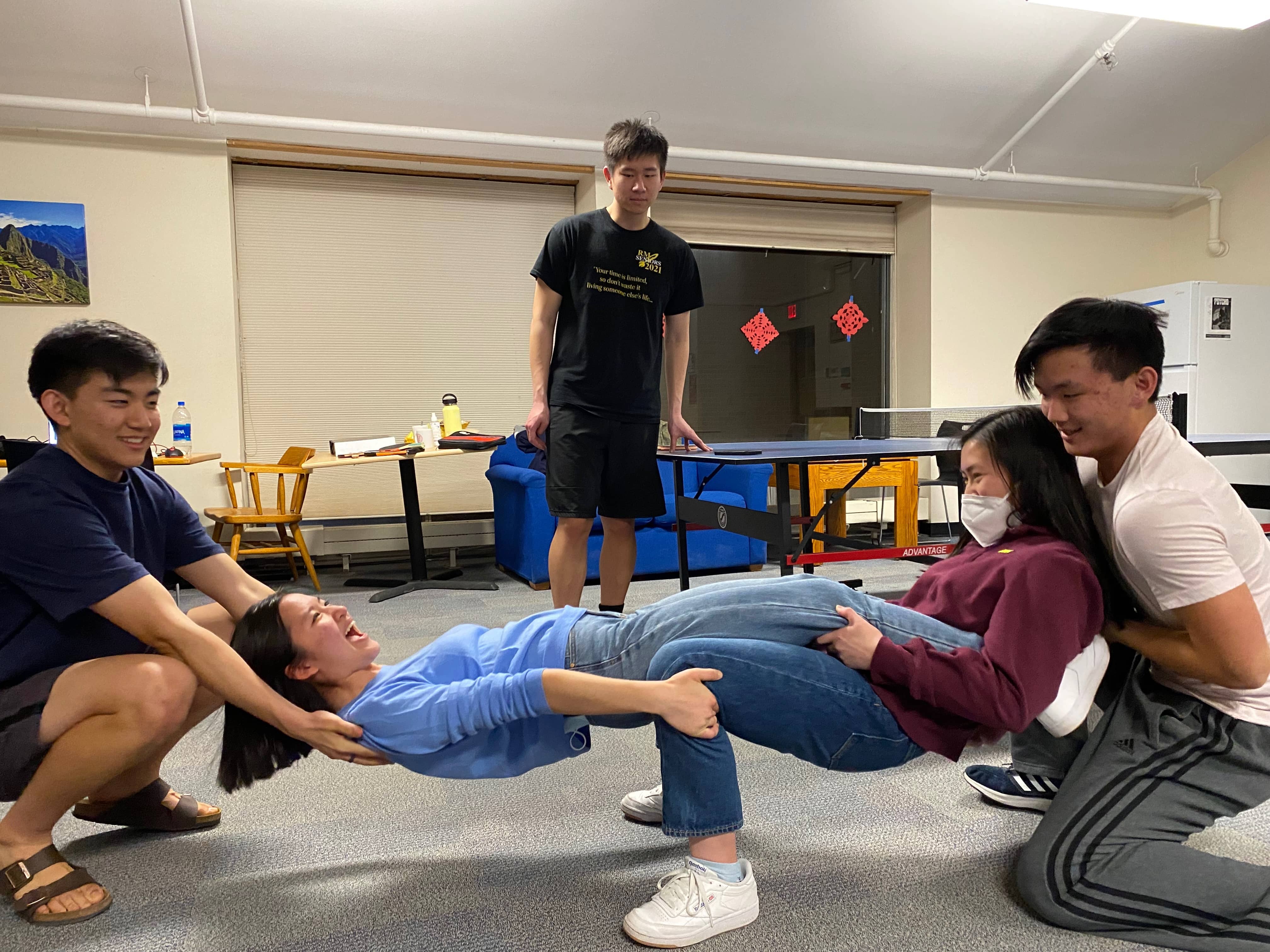 Grace and Elisabeth try to balance on each other