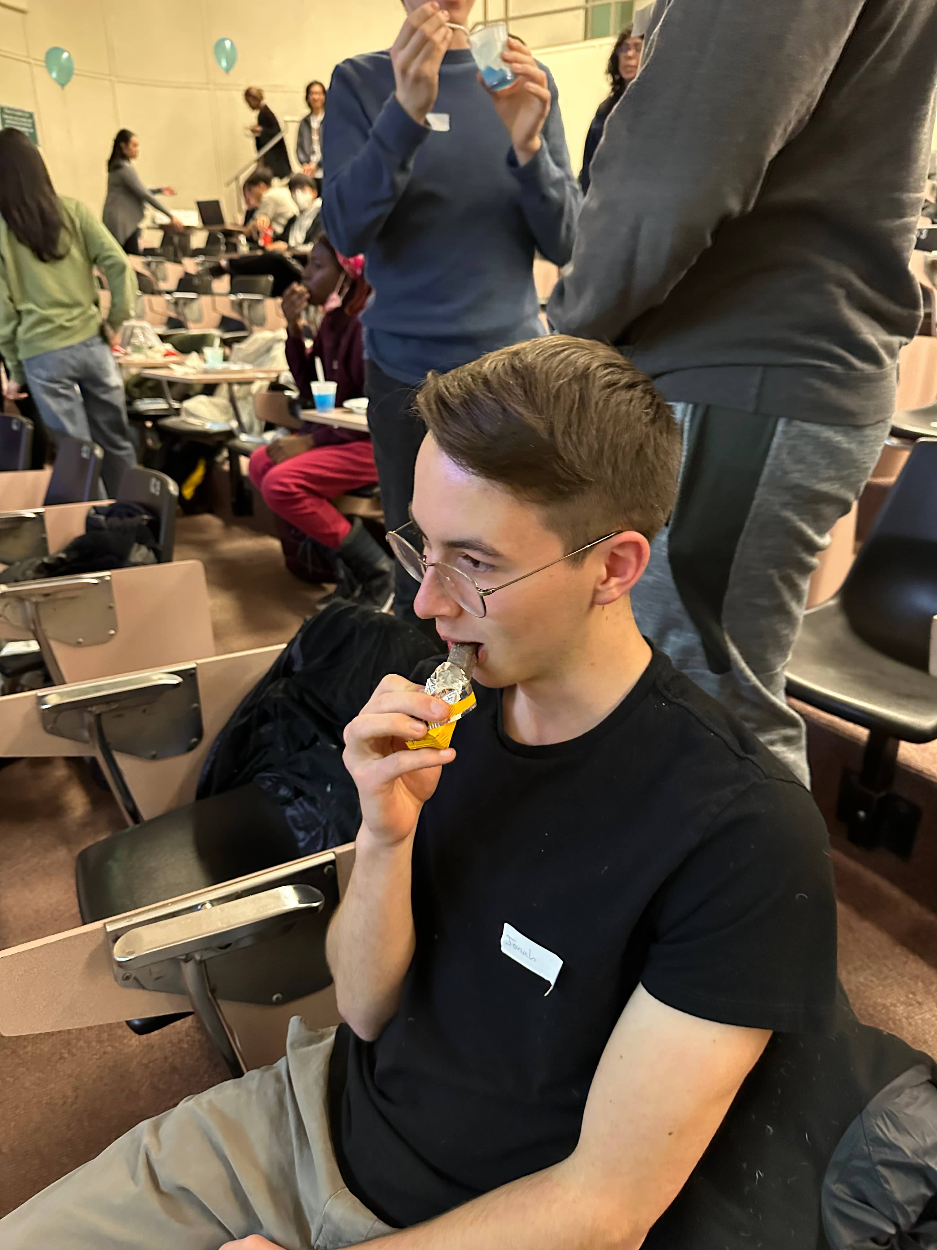 Jonah eating a chocolate bar
