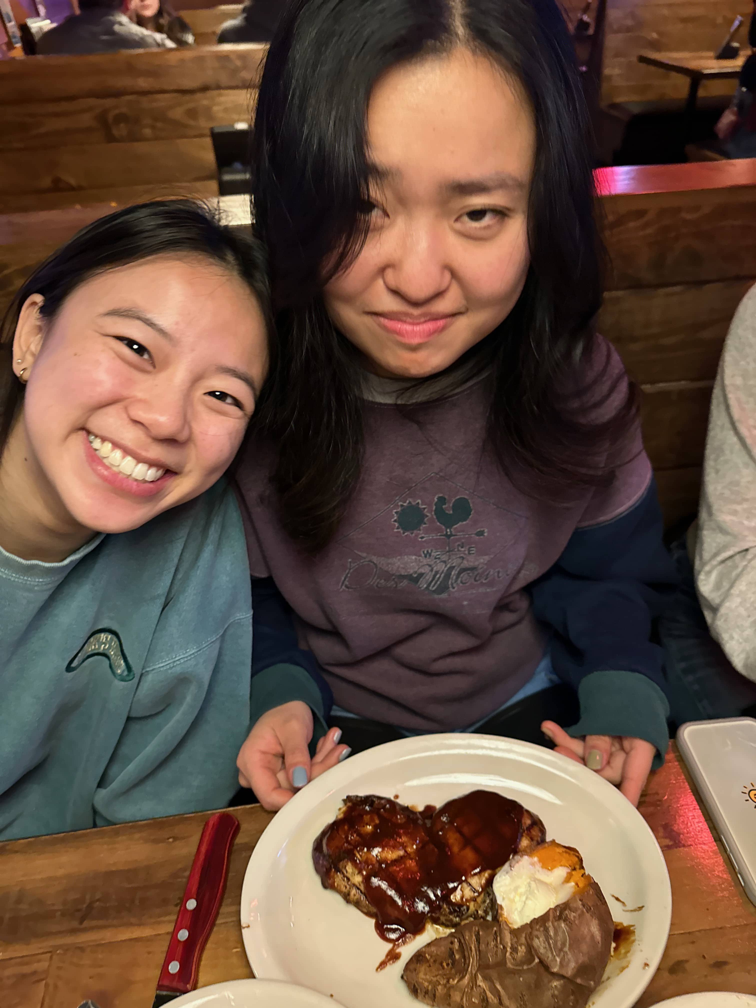 Aleena orders chicken at a steak restaurant