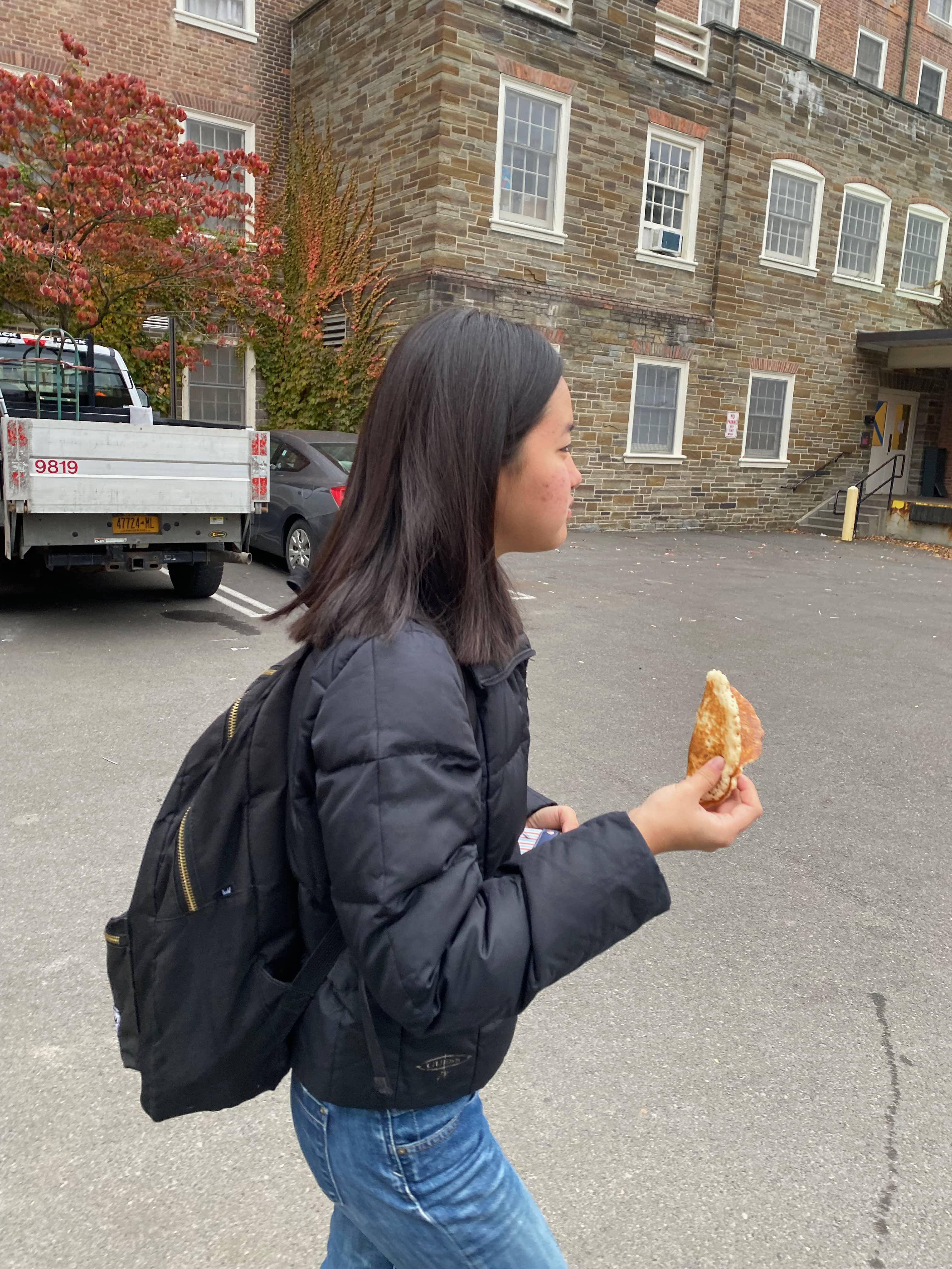 Elisabeth holds a pancake