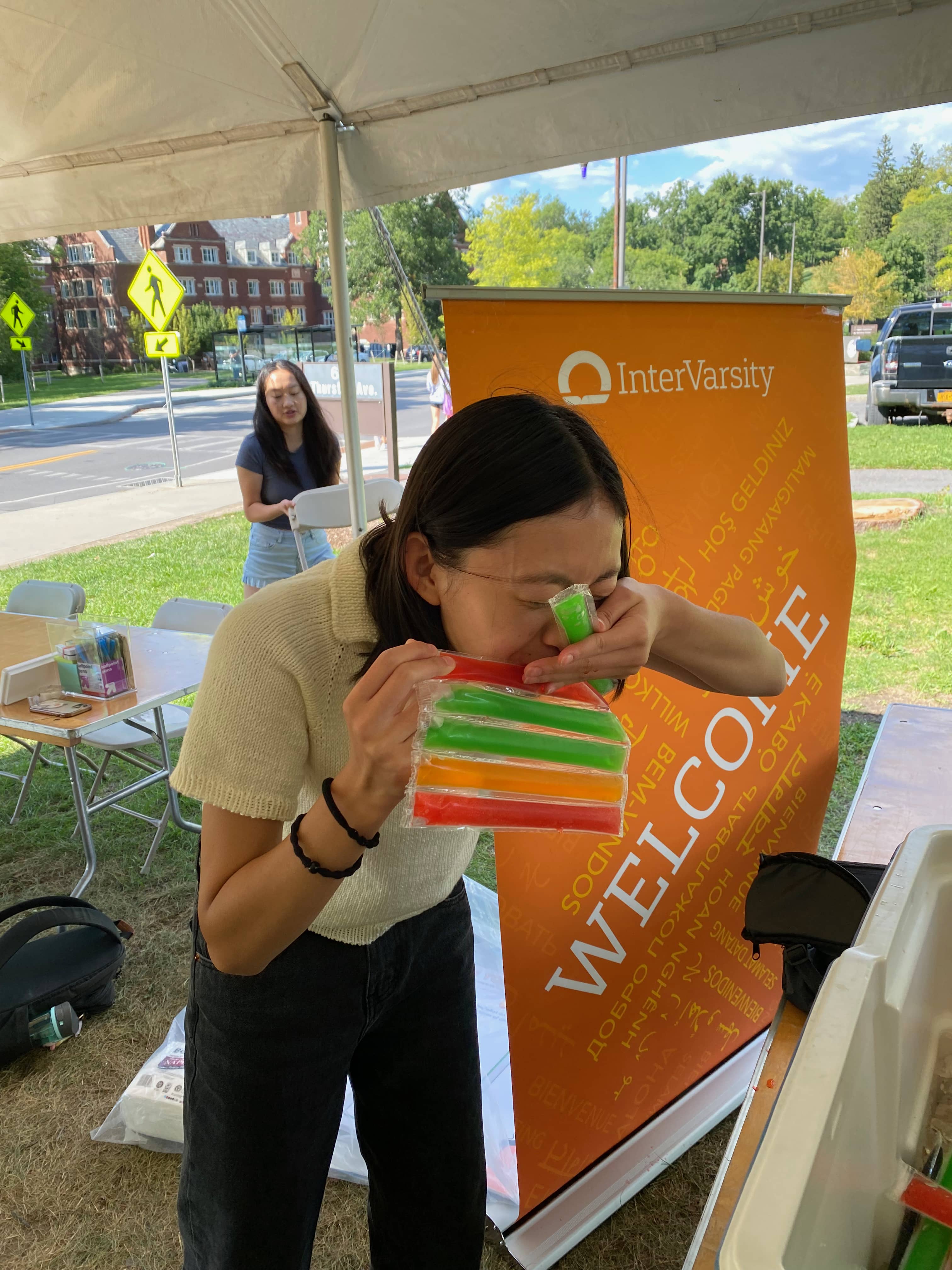 Melody eats the ice pops